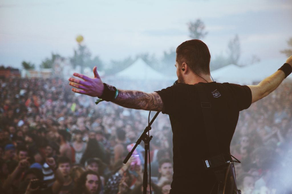 Singer in front of crowd.