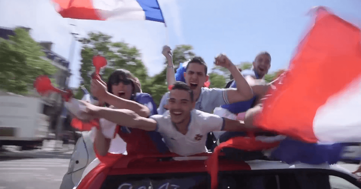 COPA90-France-Victory copy Spirited fans fly the French flag during the UEFA European Championships.