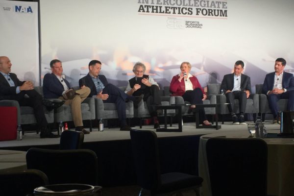 sports business journal college sponsorship panel speakers on stage