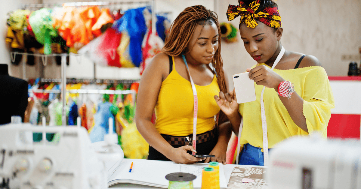 Photo of retail brand ambassadors looking at mobile phone