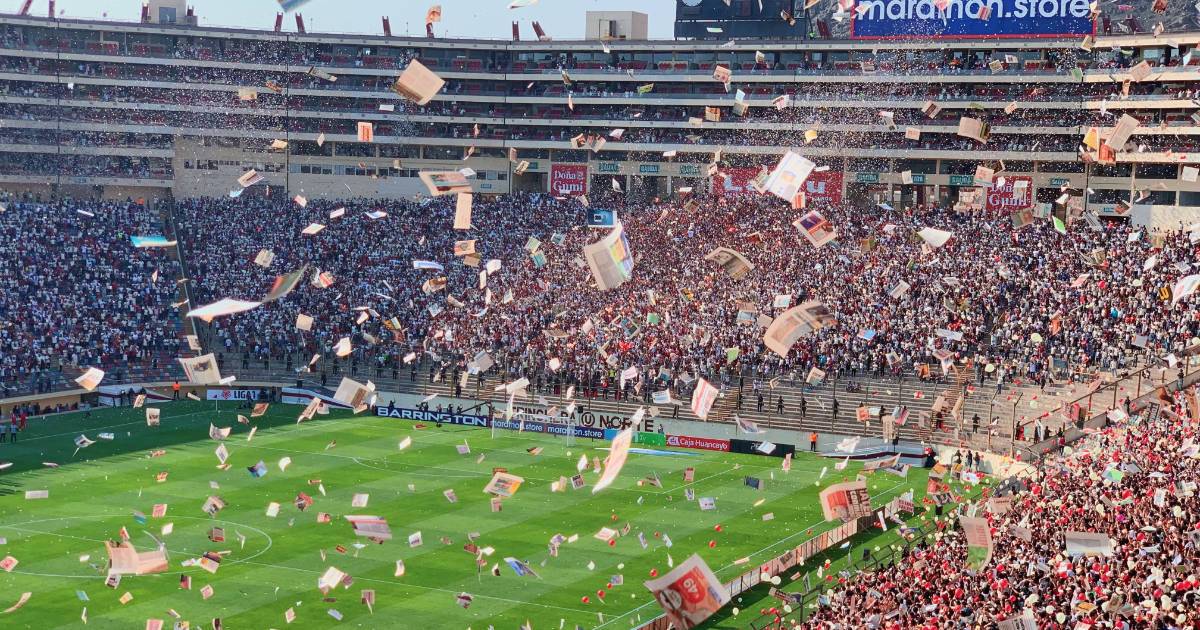 Stadium filled with sports fans and programs in the air celebrating and indicating digital media rights.