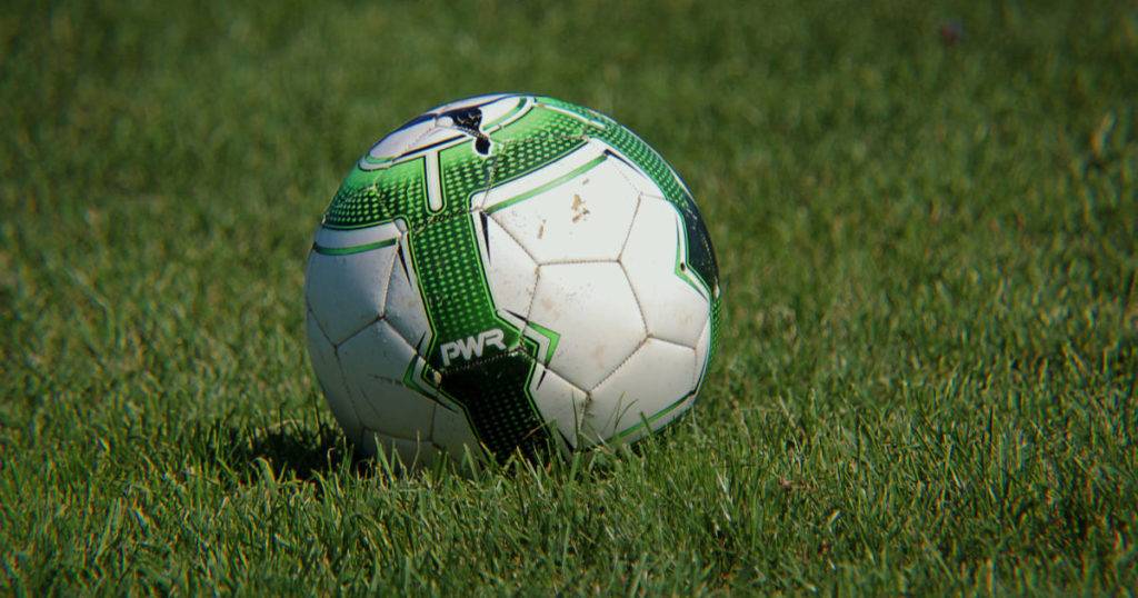 Best sports promotion using puma football on green grass