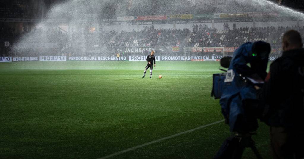 A football player on the pitch 