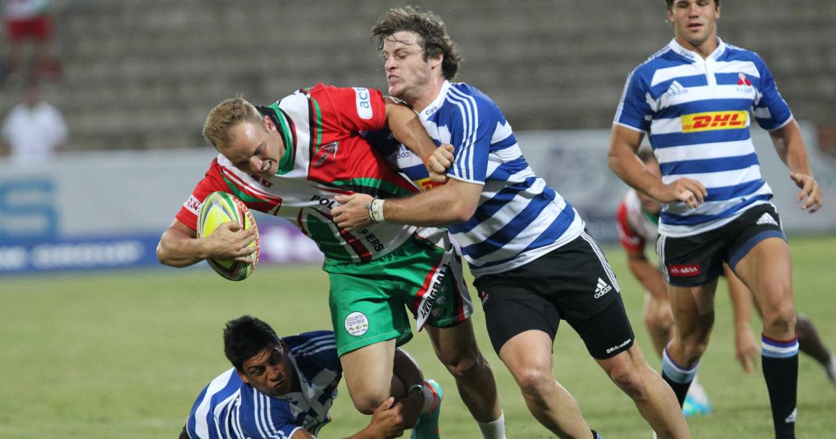 Men playing rugby have jersey logos for sponsorship activations.